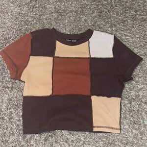 Small brown patched shirt